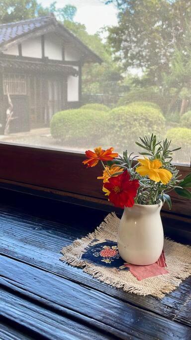 佐渡島に残る築130年の伝統的な古民家｜東夢 Villa Sado Екстериор снимка